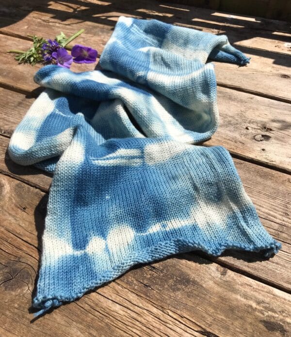 Hand dyed organic indigo shibori  sockblank. Sockweight superwash merino with nylon blend.