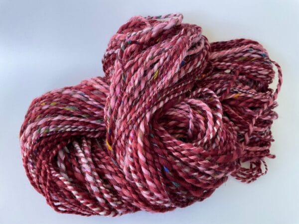 Hand spun yarn chunky weight. Merino, Alpaca and sari silk.
