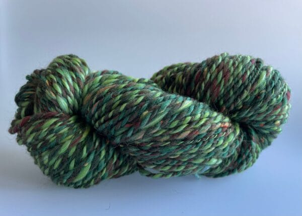 il_fullxfull.4690622983_2hhx.jpg Hand spun Shetland yarn combined with merino and sari silk in forest greens.