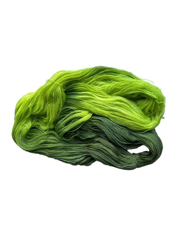 Soft, hand dyed, lace weight yarn. Superwash, non-mulesed Merino and bamboo. Pooling avacado green with fluorescent chartreuse stripes.