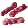 il_fullxfull.5675216354_cueo.jpg Hand dyed superwash Merino and bio nylon sock weight yarn. Warm pink and white with fluorescent speckles.
