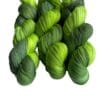 Soft, hand dyed, lace weight yarn. Superwash, non-mulesed Merino and bamboo. Pooling avacado green with fluorescent chartreuse stripes.