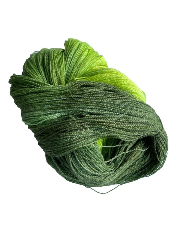 Soft, hand dyed, lace weight yarn. Superwash, non-mulesed Merino and bamboo. Pooling avacado green with fluorescent chartreuse stripes.