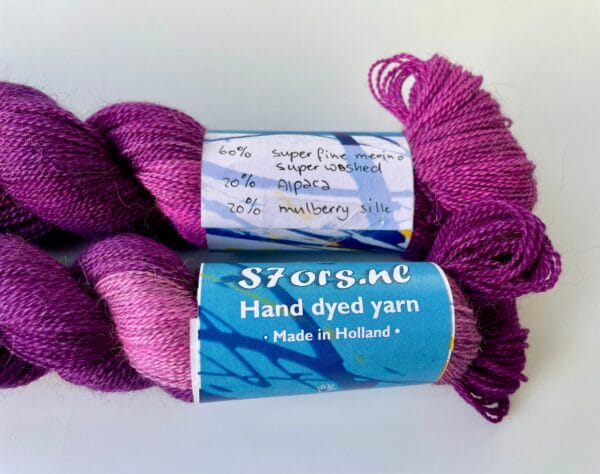 il_fullxfull.5695988604_oe46.jpg Hand dyed superwash superfine Merino, Alpaca and mulberry silk yarn. Pooling pink and deep purple.