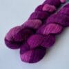 il_fullxfull.5695988912_6qhw.jpg Hand dyed superwash superfine Merino, Alpaca and mulberry silk yarn. Pooling pink and deep purple.