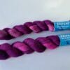 il_fullxfull.5744040011_azeh.jpg Hand dyed superwash superfine Merino, Alpaca and mulberry silk yarn. Pooling pink and deep purple.