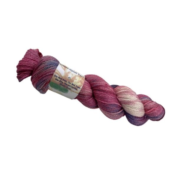 il_fullxfull.5791478506_3mvp.jpg Hand dyed super wash Merino and bamboo sock yarn in warm red, pink and blue.