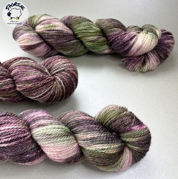 il_fullxfull.5910545139_kwz7.jpg Hand dyed super wash Merino and bamboo sock weight yarn ‘Aubergine salad’.