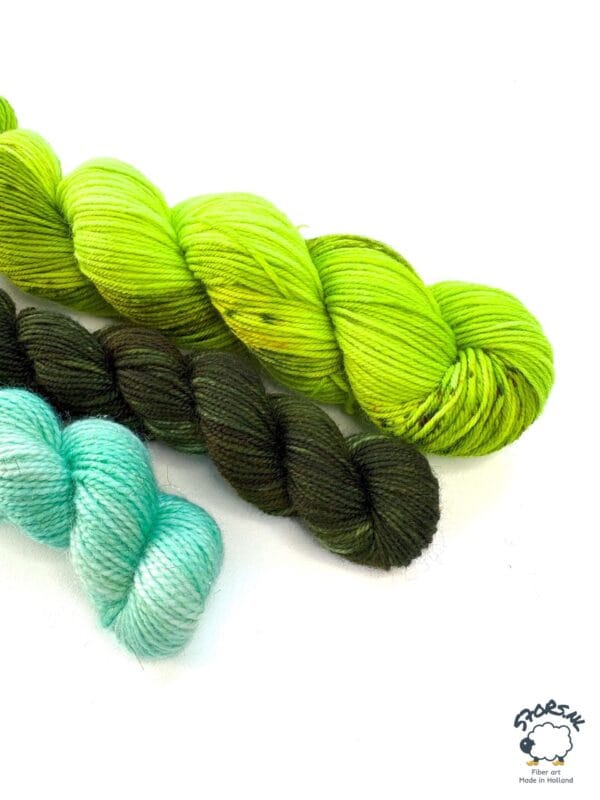 Hand dyed superwash superfine Merino and nylon fingering weight yarn sock set. ‘La fée verte’