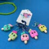 il_fullxfull.5820616586_irbd.jpg Five stitch markers with popsicles.