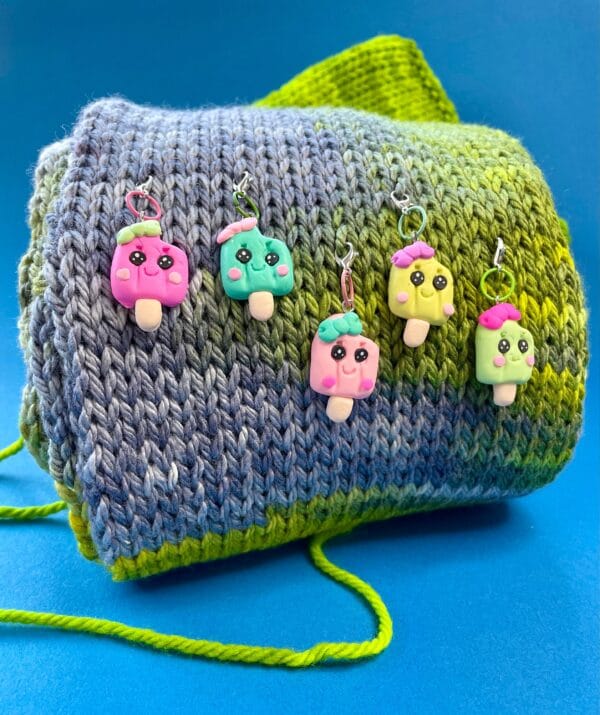 il_fullxfull.5868707045_pzt0.jpg Five stitch markers with popsicles.