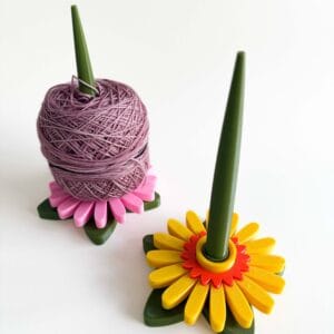 3D-geprinte garenhouders in bloementhema
